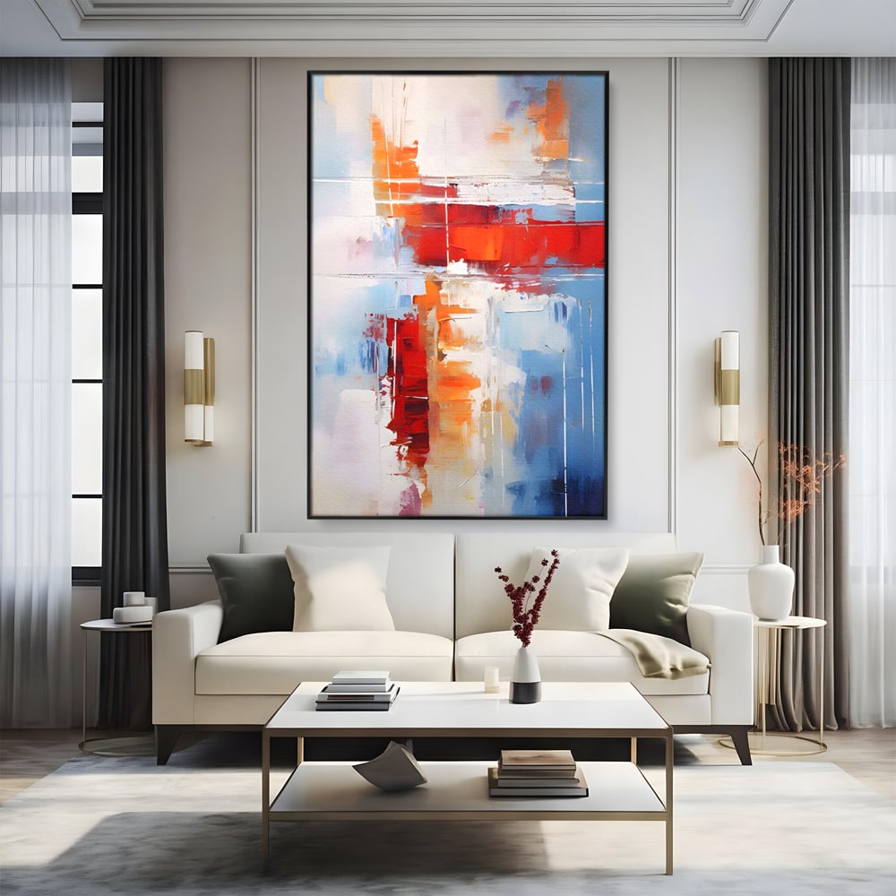 Tablou canvas cu pictura abstracta cu rosu si albastru, in rama de aluminiu negru, pe perete intr-un living
